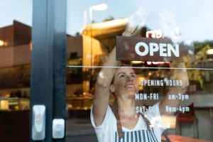A woman opening a store after Google Map Pack Success